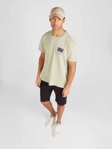 Tommy Jeans - Camiseta 'Essential' en verde