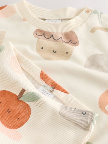 Set Next en beige