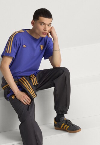 ADIDAS PERFORMANCE Λειτουργικό μπλουζάκι 'Manchester United Terrace Icons' σε λιλά