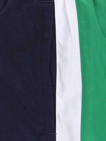UNDER ARMOUR Wide leg Sports trousers in Blue
