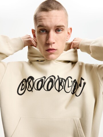 Sweat-shirt Bershka en beige