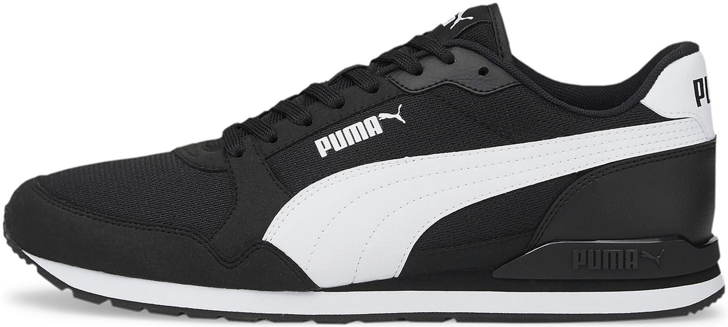 PUMA Sneakers in Black: front