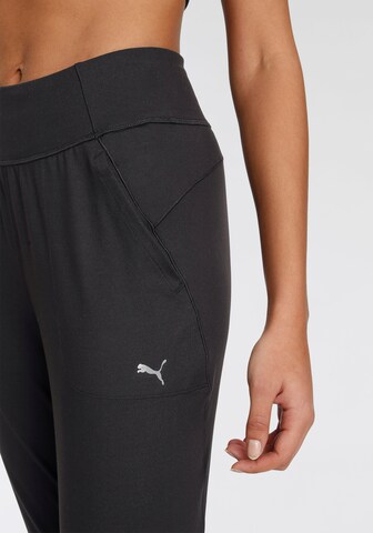 PUMA Tapered Sportbroek in Zwart