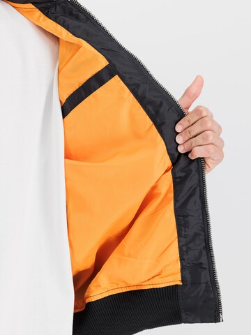 ALPHA INDUSTRIES Between-Season Jacket 'MA-1 TT' in Black