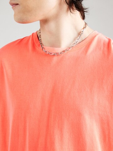 Superdry T-shirt 'Essential' i orange