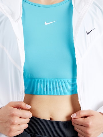 NIKE - Camiseta funcional en azul