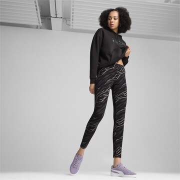 PUMA Skinny Fit Спортен панталон 'ESS+' в черно