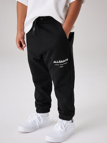 smALLSAINTS Tapered Housut 'Underground' värissä musta: etupuoli