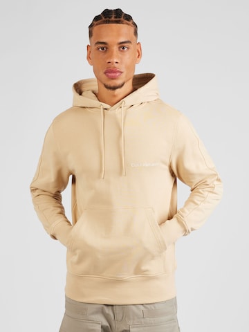 Calvin Klein Jeans Sweatshirt in Beige: voorkant