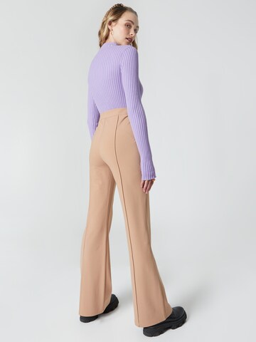 évasé Pantalon 'Spruce' florence by mills exclusive for ABOUT YOU en beige