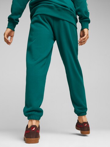 PUMA Zúžený Kalhoty 'PUMA X STAPLE' – zelená
