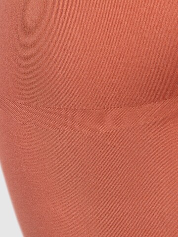 Smilodox Skinny Sporthose 'Amaze Pro' in Orange