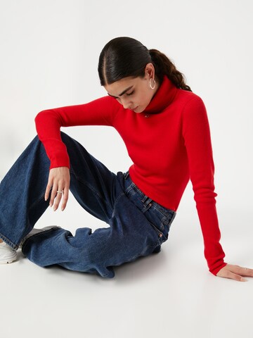 Pull-over 'Essential' Tommy Jeans en rouge : devant