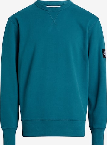 Sweat-shirt Calvin Klein Jeans en bleu : devant