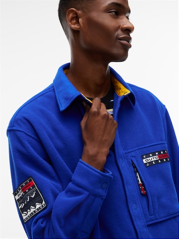 mėlyna Tommy Jeans Patogus modelis Flisinis džemperis