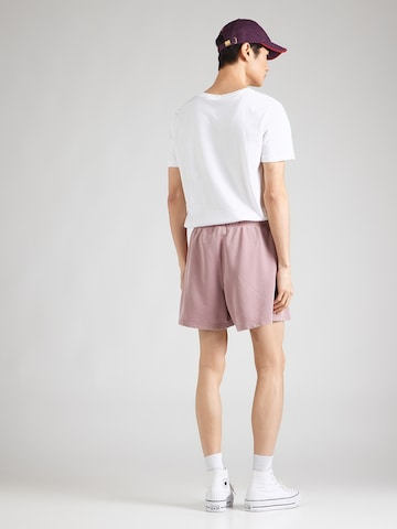 Largi Pantaloni de la Champion Authentic Athletic Apparel pe roz