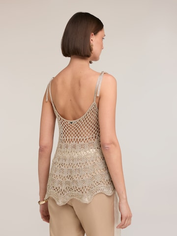 Pull-over MOTIVI en or