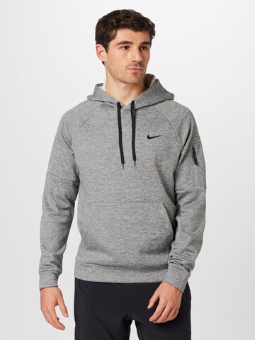 Sweat de sport NIKE en gris : devant