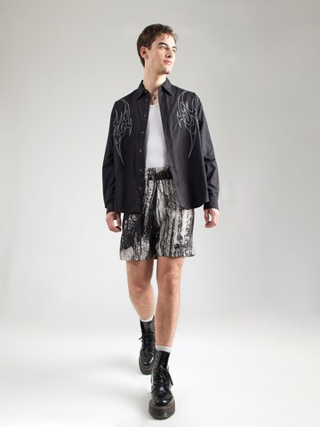 Carlo Colucci Regular Housut värissä musta