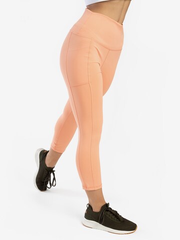 Spyder Skinny Sportbroek in Oranje: voorkant