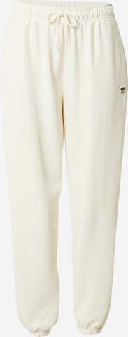 PUMA - Tapered Pantalón deportivo en beige: frente