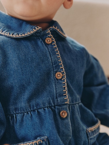 Ensemble Next en bleu