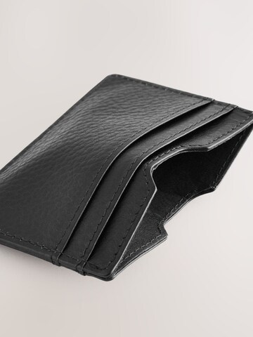 Next Puzdro - Čierna