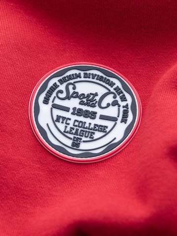Sweat-shirt Ombre en rouge