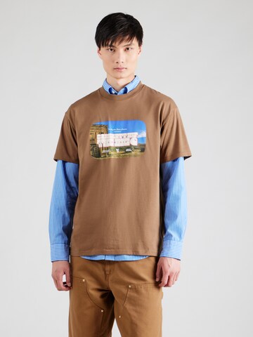 Carhartt WIP - Camiseta 'Greatest Flicks' en marrón: frente