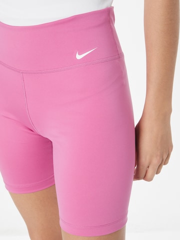 NIKE Skinny Spodnie sportowe 'One' w kolorze różowy