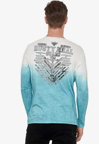 Rusty Neal Longsleeve mit großem Front- Print in Blau