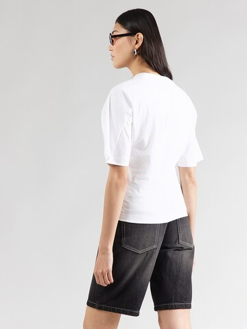 PUMAMajica 'DARE TO' - bijela boja