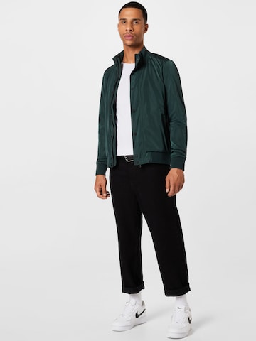 Superdry Prehodna jakna 'STUDIO HARRINGTON' | zelena barva