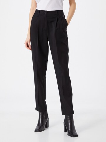 Calvin Klein Tapered Pleat-front trousers in Black: front