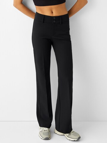 Bershka Flared Pleated Pants in Black