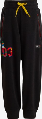 ADIDAS SPORTSWEAR Tapered Workout Pants in Black: front