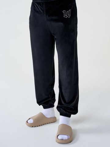 Tapered Pantaloni 'Dominic' di ABOUT YOU x Dardan in nero