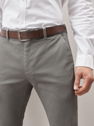Slimfit Pantaloni chino di Next in grigio