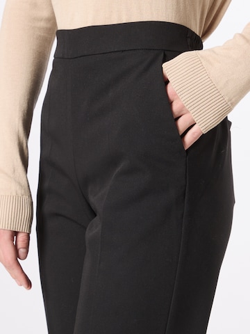 Loosefit Pantaloni con piega frontale 'Sakura' di Kaffe in nero