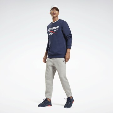 Sweat-shirt Reebok en bleu