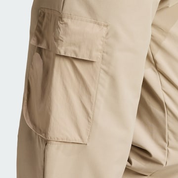 ADIDAS SPORTSWEAR Regular Workout Pants 'City Escape Premium' in Beige