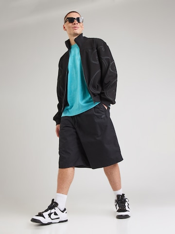 Maglietta 'M90 PRE ESS' di Nike Sportswear in verde