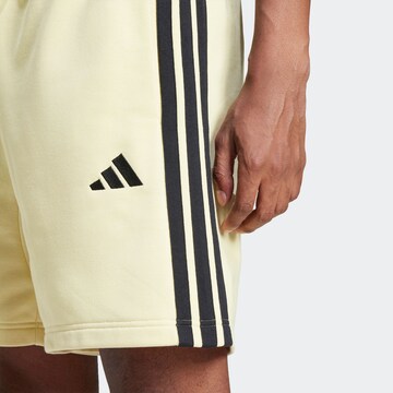 ADIDAS SPORTSWEAR Regular Sports trousers 'Essential' in Yellow