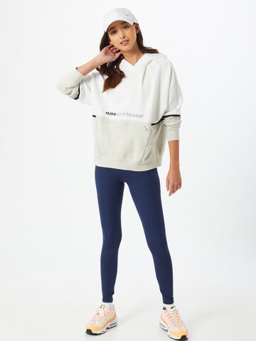 NIKE Skinny Sportbroek 'One Luxe' in Blauw