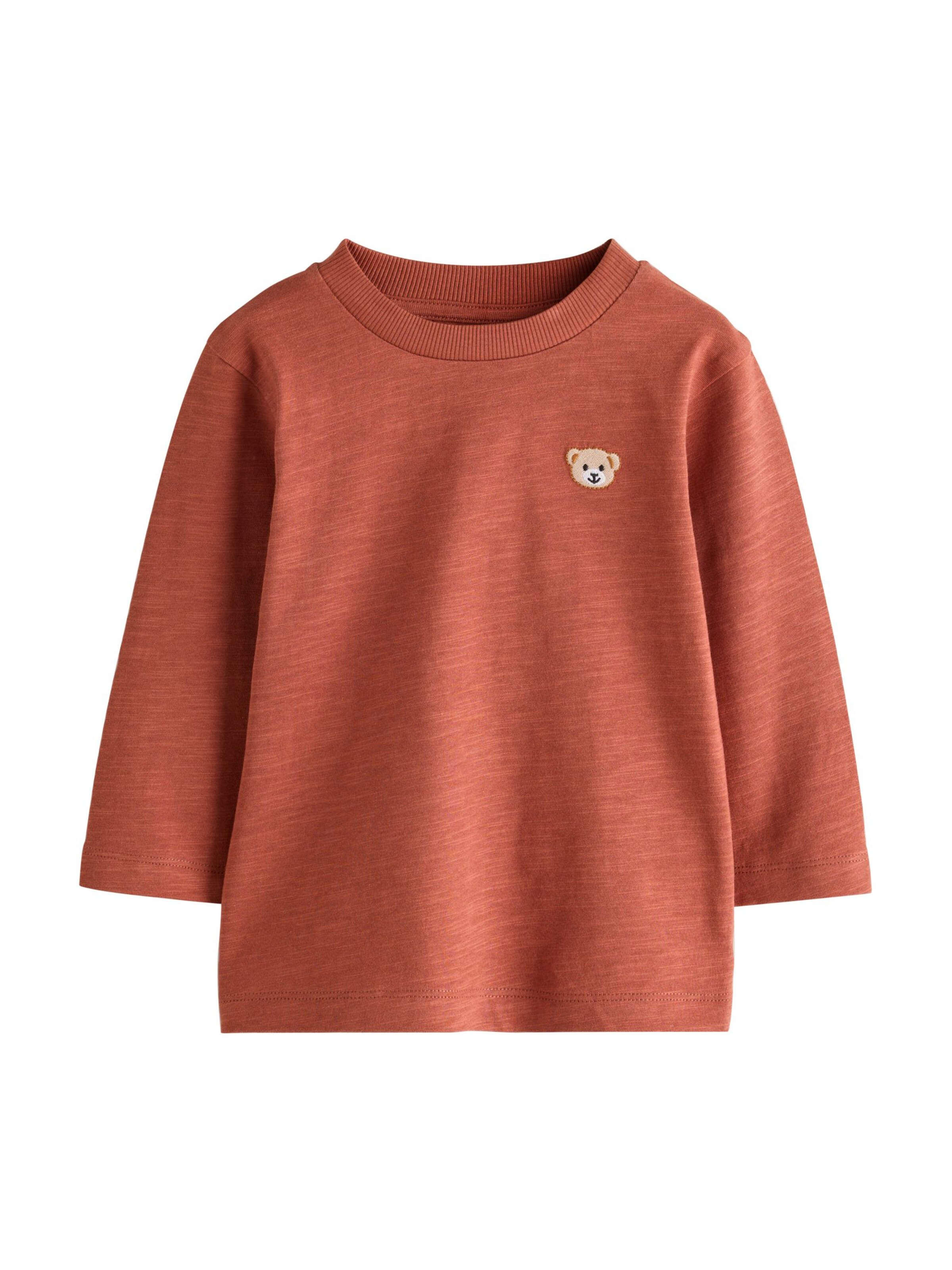 Tricou de la Next pe bej