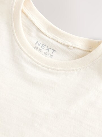 T-Shirt Next en blanc