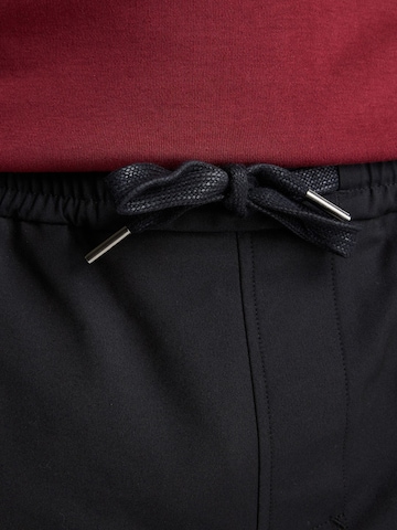 Regular Pantalon cargo 'Rift Flow' CHASIN' en noir