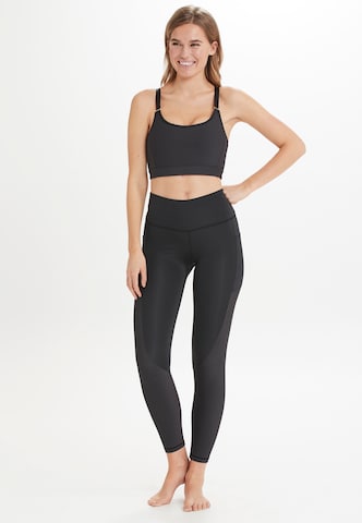 Athlecia Slim fit Workout Pants 'Filucca' in Black