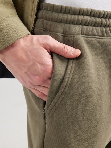 HOLLISTER Baggy Hose in Grün