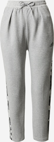 ADIDAS SPORTSWEAR - Tapered Pantalón deportivo 'Graphic' en gris: frente